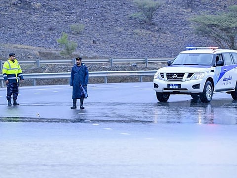 Sharjah Police officers remain vigilant during the recent heavy rains to ensure safety of motorists.
