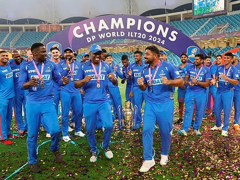 MI Emirates players celebrate during the prize distribution ceremony after winning the ILT20 title on Saturday.