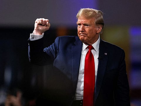 Former U.S. President and Republican presidential candidate Donald Trump gestures as he participates in a Fox News town hall with Laura Ingraham in Greenville, South Carolina, U.S. February 20, 2024.