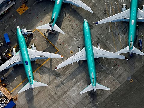 An aerial photo shows Boeing 737 MAX airplanes parked on the tarmac at the Boeing Factory in Renton, Washington.