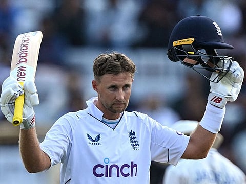 England's Joe Root celebrates after scoring his 31st career Test century during the first day of the fourth Test against India at Ranchi on Friday.