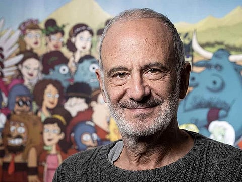 Gerard Miller poses during a photo session at the launch of the comic strip "50 nuances de Grecs" in Paris, on November 15, 2019.