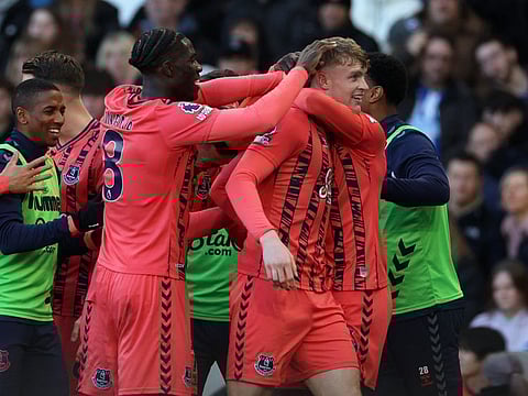 Everton's Jarrad Branthwaite celebrates scoring their first goal with teammates during a Premier League against Brighton & Hove Albion at The American Express Community Stadium, Brighton, Britain on Saturday.