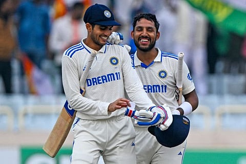 India's Shubman Gill (left) and Dhruv Jurel celebrate their win at the end of the fourth day of the fourth Test cricket match against England at the Jharkhand State Cricket Association Stadium in Ranchi on Monday.