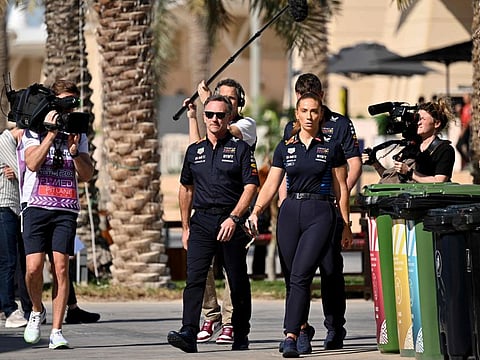 Red Bull Racing's team principal Christian Horner walks to a press conference during the second day of the Formula One pre-season testing at the Bahrain International Circuit in Sakhir on February 22.