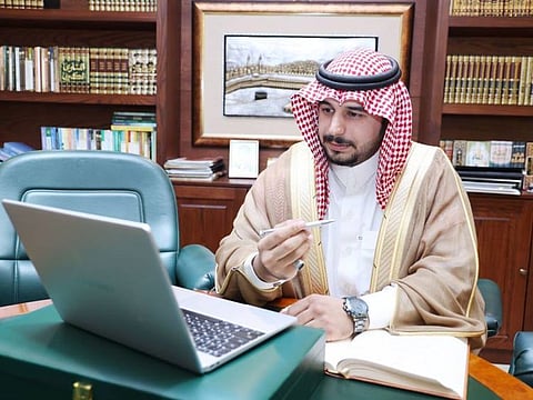 Saudi lawyers clad in the bisht and formal dress while doing the job.
