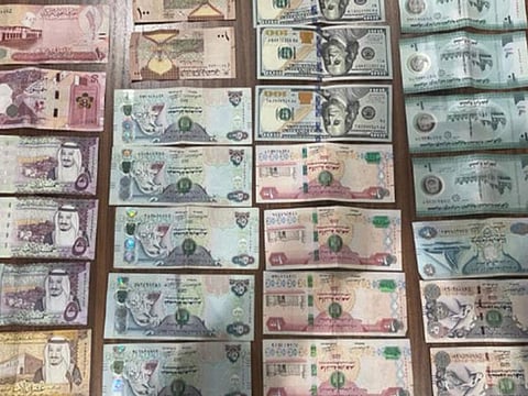 Foreign currencies worth over Dh30,000 ($8,168) seized from a beggar in February 2024 by police.