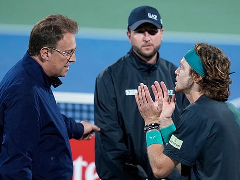 ATP Supervisor Roland Herfel (left) disqualifies Andrey Rublev during his semi-final match with Alexander Bublik of Kazakhstan at the Dubai Duty Free Tennis Championships on Friday.