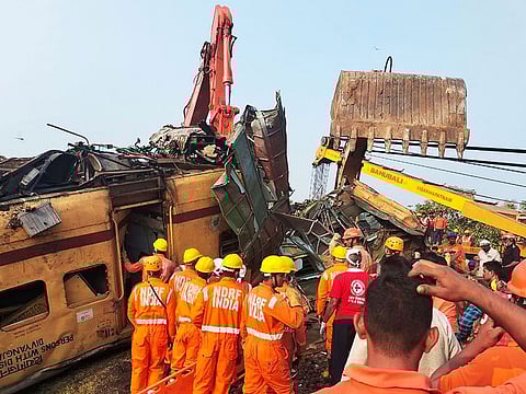 Members of the National Disaster Response Force (NDRF) conduct rescue operation at the site of train crash in Vizianagaram district of India's Andhra Pradesh state on October 30, 2023.