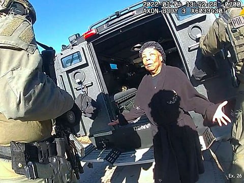 This image taken from Denver Police body camera footage provided by the American Civil Liberties Union of Colorado shows Ruby Johnson, a 78-year-old Colorado woman, surrounded by SWAT officers, Jan. 4, 2022, in Colorado.