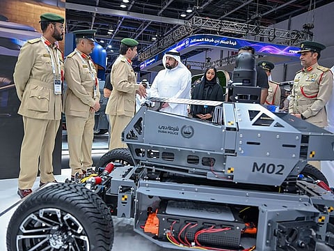 Sheikh Ahmed bin Mohammed bin Rashid Al Maktoum (4th L), Second Deputy Ruler of Dubai, and Dubai Police Chief Lt Gen Al Marri (R) at the World Police Summit in Dubai on Tuesday