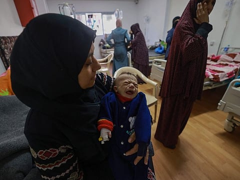 Palestinian children suffering from malnutrition receive treatment at a healthcare center in Rafah in the southern Gaza Strip on March 5, 2024.