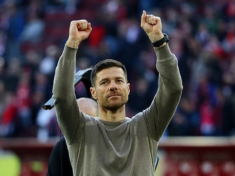 Bayer Leverkusen coach Xabi Alonso celebrates after Bundesliga match against FC Cologne on March 3.