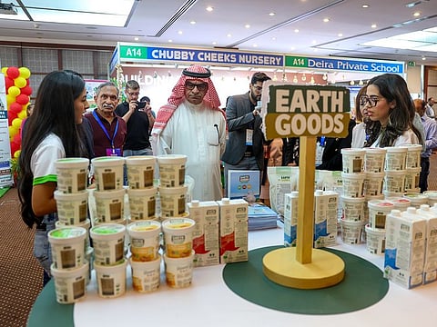 Abdul Hamid Ahmad, CEO and Editor-in-Chief of Gulf News interacts with Earth Goods staff at the Gulf News Edufair Schools & Nurseries event
