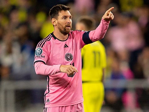 Inter Miami forward Lionel Messi (10) points to his teammates after his goal against the Nashville SC during the second half on Wednesday.