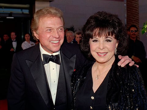 Singer Steve Lawrence, left, and his wife Eydie Gorme arrive at a black-tie gala called honoring Frank Sinatra in Las Vegas on May 30, 1998.
