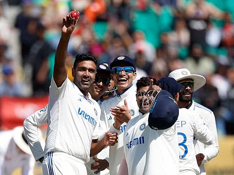India's Ravichandran Ashwin acknowledges the fans and celebrates his five-wicket-haul with teammates after taking the wicket of England's Ben Foakes, in the Fifth Test between India and England.