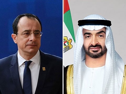 Nikos Christodoulides (L) and Sheikh Mohamed bin Zayed Al Nahyan (R).