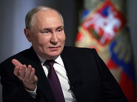 Russian President Vladimir Putin speaks during an interview with Rossiya Segodnya International Media Group Director General Dmitry Kiselev, in Moscow, Russia, Tuesday, March 12, 2024.