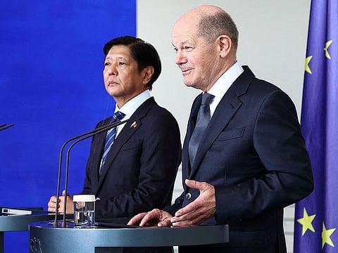 German Chancellor Olaf Scholz (R) and Philippine President Ferdinand Marcos Jr. (L).