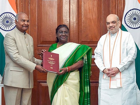 Former President Ram Nath Kovind, who heads the High-Level Committee on 'One Nation, One Election', along with committee member Union Home Minister Amit Shah, presents the report on simultaneous elections to President Droupadi Murmu, at Rashtrapati Bhavan, in New Delhi on Thursday, March 14, 2023.