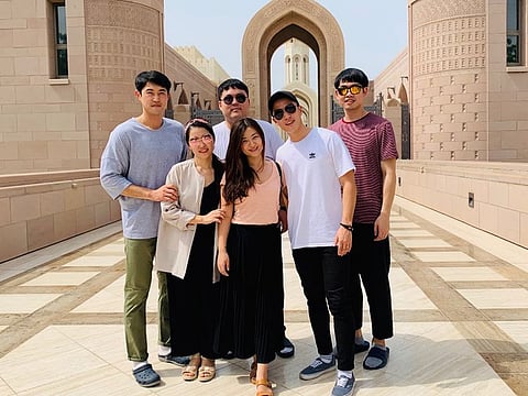 You-Mee Kim, a nurse at Abu Dhabi's Cleveland Clinic (center), with Namho Kwon, a Taekwondo coach (far left) with their friends, fellow Korean expats, Jae Heon Choo, Jae Hyuk Choi, Nahee Kim and Minjin Lee.