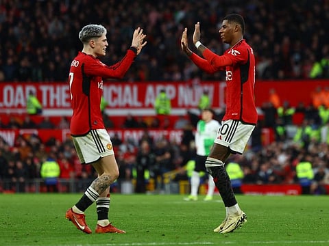 Manchester United's Alejandro Garnacho and Marcus Rashford celebrate after Amad Diallo scores their fourth goal.