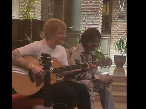 A video of the singer performing 'Perfect' with the Bollywood superstar Shah Rukh Khan sitting next to him is going viral