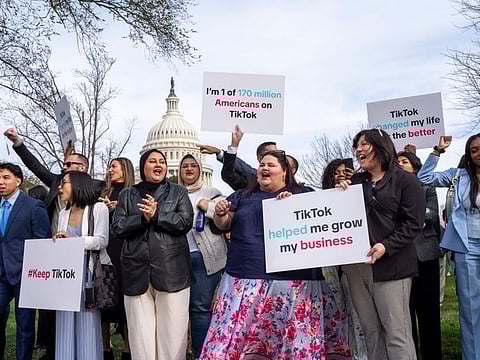 TikTok fans gather at the Capitol in Washington as the House passed a Bill that would lead to a nationwide ban of the popular video app if its China-based owner doesn't sell.