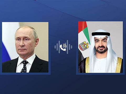 Vladimir Putin (L) and Sheikh Mohamed bin Zayed Al Nahyan.