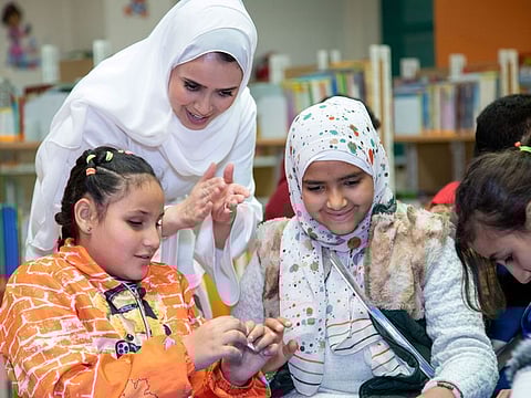Families in refugee camps abroad make the most of Arabic books donated by Kalimat Foundation