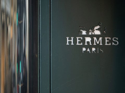 Hermes requires potential buyers to purchase thousands of dollars of other products for the chance they’ll get access to the leather totes, according to a lawsuit.