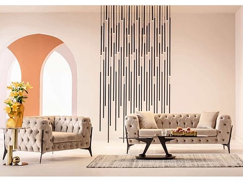 The Bellissima Corner Sofa boasts a beige 3-seater design with a solid beech wood frame and soft velvet-feel upholstery, combining classic charm with modern aesthetics.