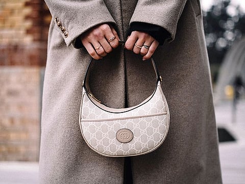 Tap into the star of handbag trends this year and gift yourself or a loved one a versatile crescent purse, this Eid.