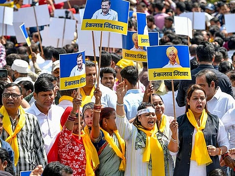 Aam Aadmi Party (AAP) MLAs, counselors and supporters holding placards protest against the arrest of Delhi CM and party national convener Arvind Kejriwal by the Enforcement Directorate (ED) in an alleged Delhi excise policy case, at Shaheedi park in New Delhi on Saturday.