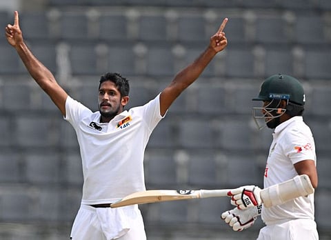 Sri Lanka's Kasun Rajitha celebrates the wicket of Bangladesh's Khaled Ahmed during the fourth day of the first Test cricket match at the Sylhet International Cricket Stadium on Monday.