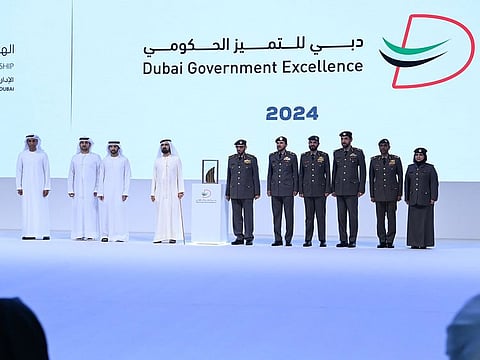 His Highness Sheikh Mohammed bin Rashid Al Maktoum, Vice President and Prime Minister of the UAE and Ruler of Dubai (4th L), with GDRFA Dubai winners during the awards ceremony on Monday