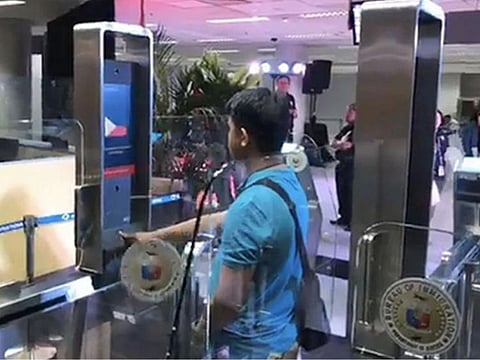 A passenger using an e-gate upon arrival at the Ninoy Aquino International Airport. To boost passenger throughput at airports, the Philippines's Bureau of Immigration (BI) is integrating airline data with the e-gate system, thus cutting the steps required for passengers, thus improving arrival experience..
