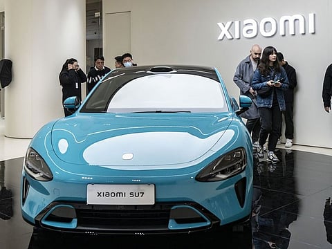 A Xiaomi Corp. SU7 electric vehicle on display at one of the company's store in Shanghai, China.