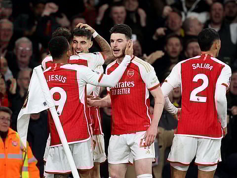 Arsenal's Kai Havertz celebrates scoring their second goal with Gabriel Jesus and Declan Rice during a Premier League match against Brentford on March 9.