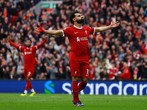 Liverpool's Mohamed Salah celebrates scoring their second goal during a Premier League match against Brighton & Hove Albion on Sunday.