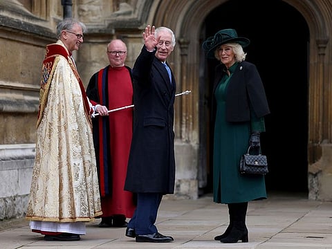 Britain's King Charles III, center, and Queen Camilla arrive to attend the Easter Matins Service at St. George's Chapel, Windsor Castle, England, Sunday, March 31, 2024.