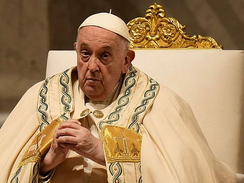 Pope Francis presides over the Easter vigil celebration in St. Peter's Basilica at the Vatican, Saturday, March 30, 2024.