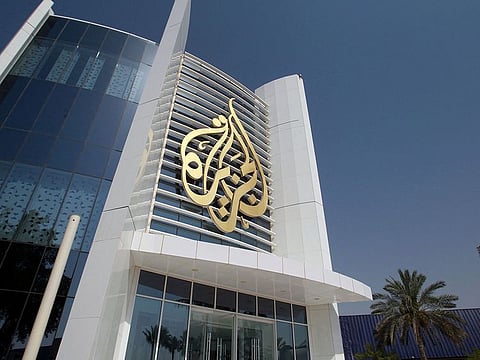 The Al Jazeera Media Network logo is seen on its headquarters building in Doha, Qatar