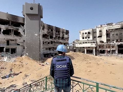 Jonathan Whittall, an OCHA official, stands near the destroyed Al Shifa Hospital during an assessment by a UN Convoy, amid the ongoing conflict between Israel and Hamas, in Gaza City, April 5, 2024, in this screen grab taken from a handout video.