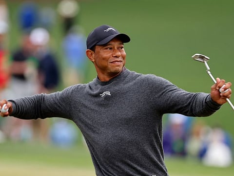 Tiger Woods of the US reacts on the green on the 9th hole during a practice round at Augusta National Golf Club on Tuesday.