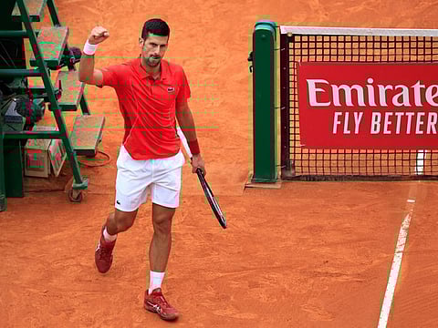 Serbia's Novak Djokovic celebrates after winning against Russia's Roman Safiullin during the Monte Carlo ATP Masters Series Tournament on Tuesday.