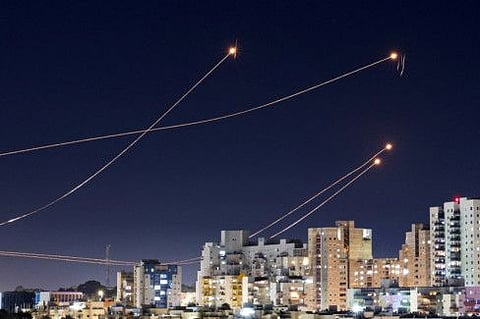 Israel's Iron Dome anti-missile system intercepts rockets launched from the Gaza Strip, amid the ongoing conflict between Israel and the Palestinian Islamist group Hamas, as seen from Ashkelon, Israel, January 15, 2024.  That defence system costs roughly $50,000 per launch.