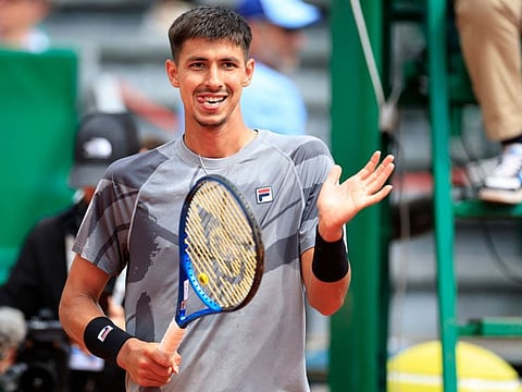 Australia's Alexei Popyrin celebrates after winning against Russia's Andrey Rublev at the end of their Monte Carlo ATP Masters Series Tournament round of 32 at the Monte Carlo Country Club on Wednesday.