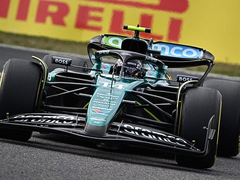 Aston Martin's Spanish driver Fernando Alonso drives during the Formula One Japanese Grand Prix race at the Suzuka circuit in Suzuka on April 7.